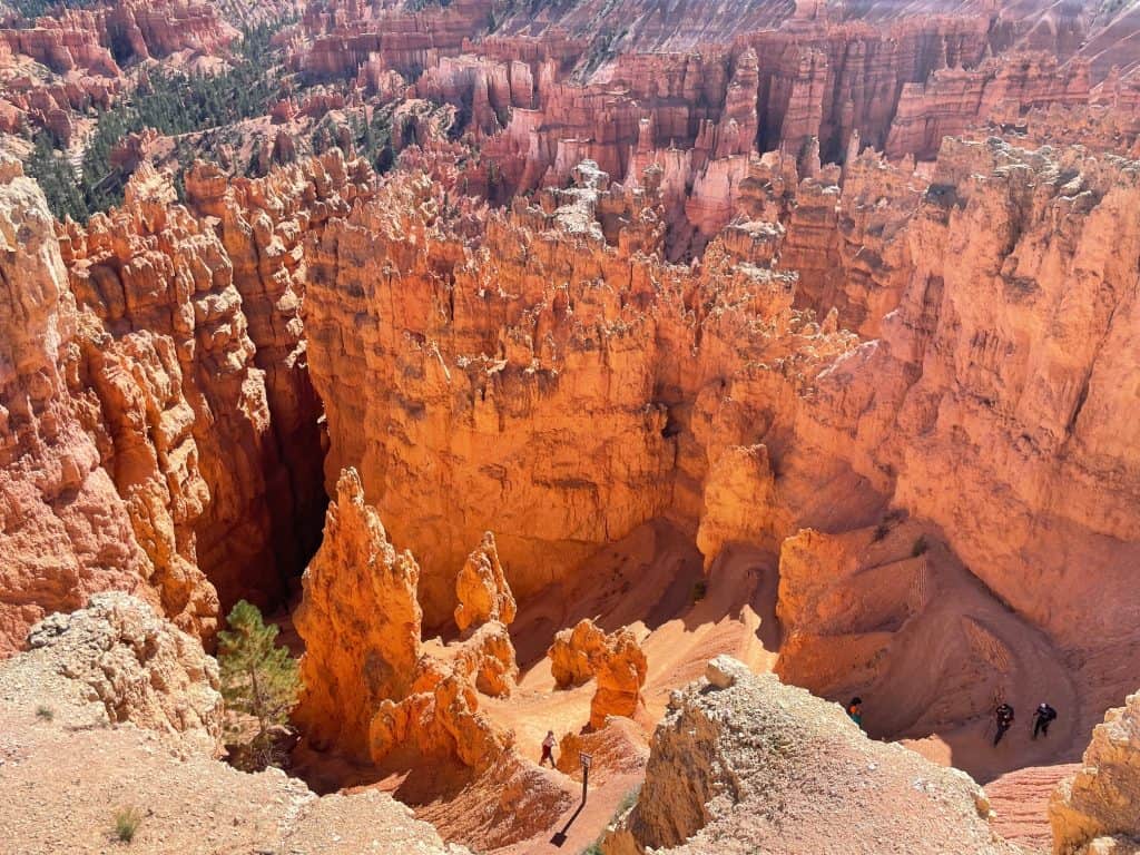 Bryce Canyon hoodoos under a blue sky.