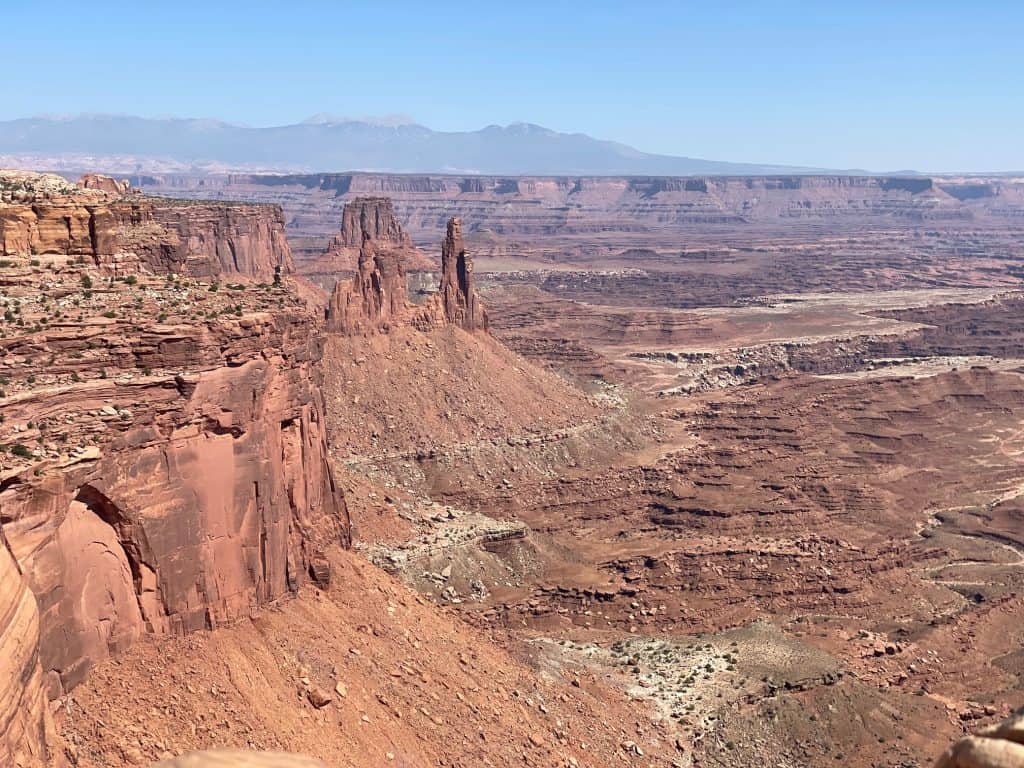 Vast Canyonlands National Park landscape with towering rock formations and deep canyons, perfect for a Utah road trip with kids