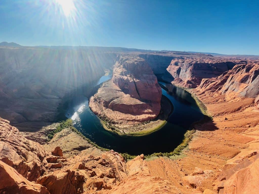 Horseshoe Bend overlook near Page, Arizona, featuring the Colorado River winding through red rock canyons