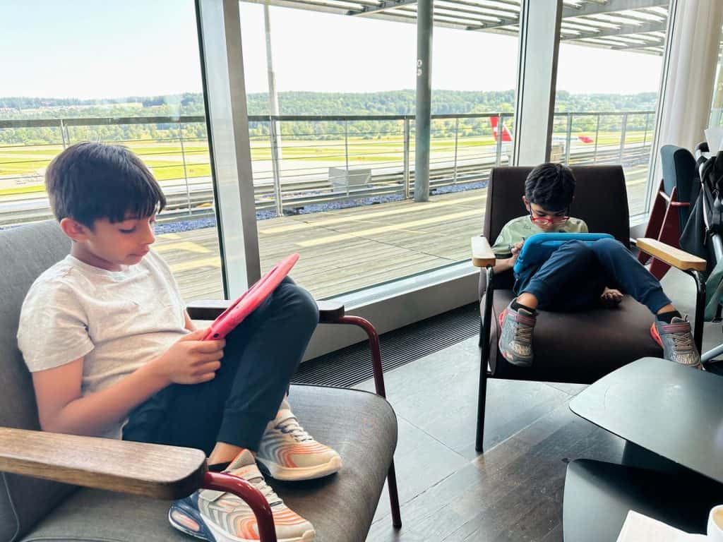 Kids relaxing at the Lounge at a layover